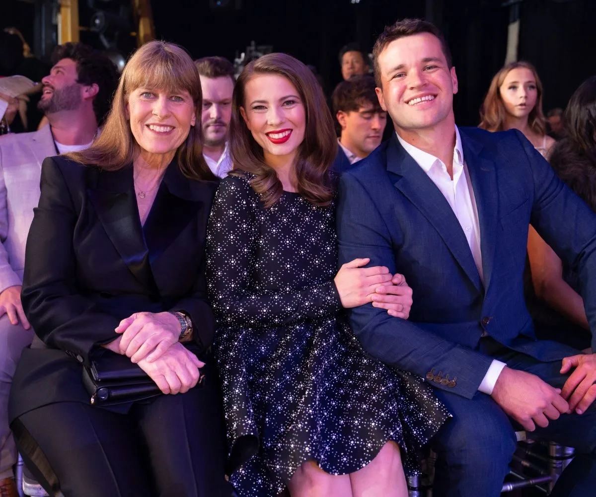 Bindi and Terri Irwin and Chandler Powell smile for the cameras