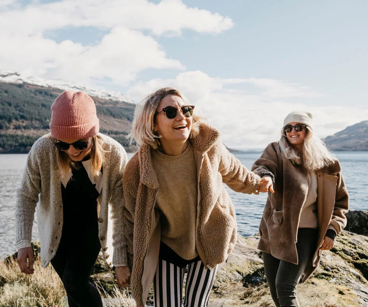 Three female friends laughing