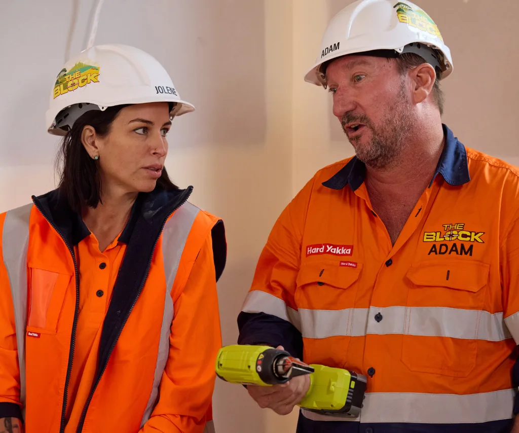 Adam and Jolene in hi vis on site of The Block 2026.