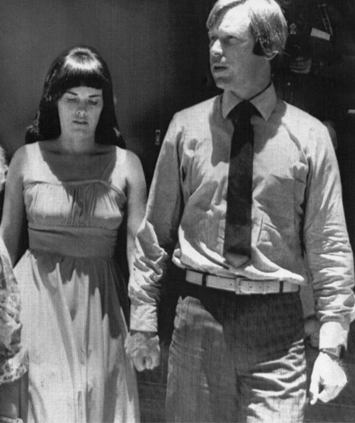 A man and woman in a black and white image.