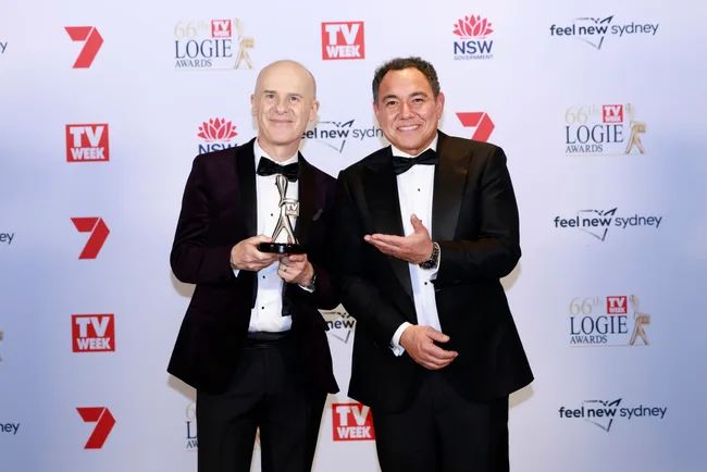 Sam Pang and Tom Gleisner accepted the Logie for Have You Been Paying Attention? (Credits: Getty)
