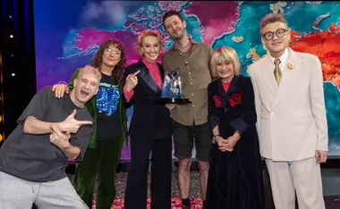 Elliot, judges and host Zen Rowe stand on the set of Race Around The World.