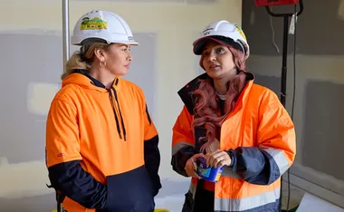 Courtney and Sev on site of The Block.