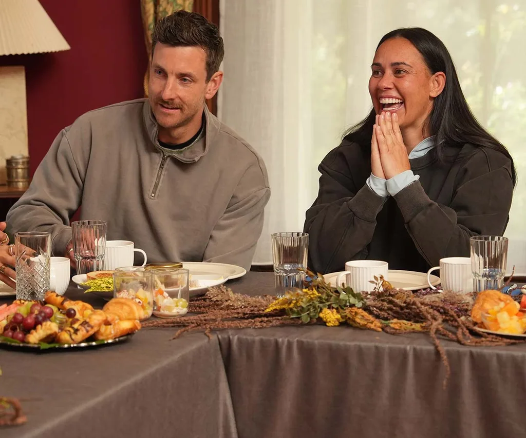 Henry and Kirby sit next to each other at a breakfast table