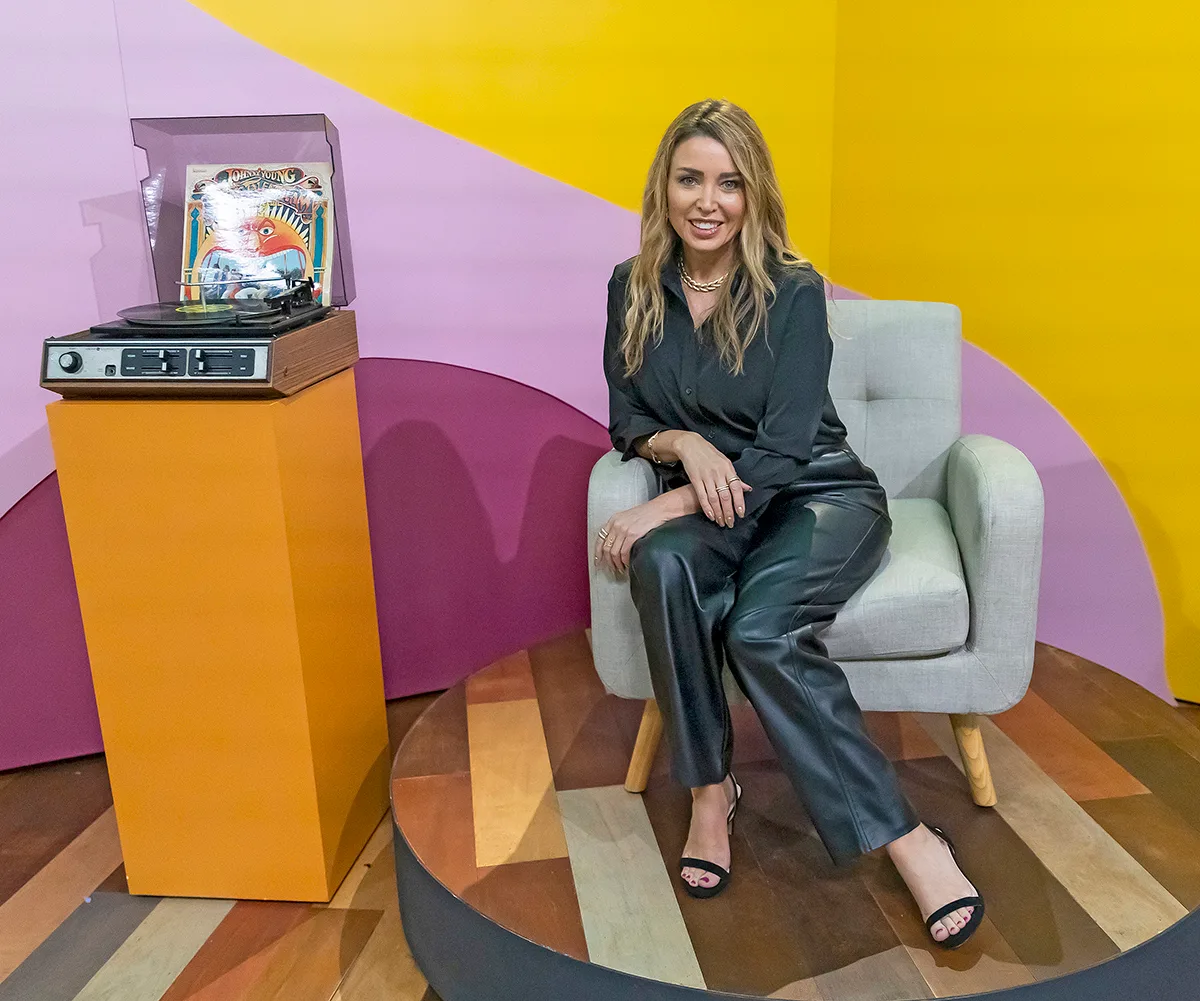 Dannii Minogue sits on the set of Portrait Artist of the Year
