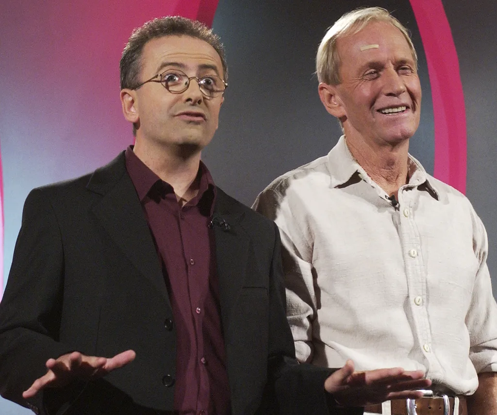 Andrew Denton stands next to Paul Hogan on the set of Enough Rope