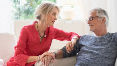 Older woman asking male partner health questions