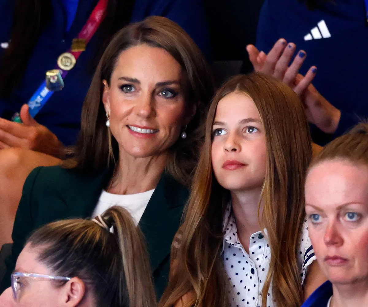 Kate Middleton and Princess Charlotte watching netball at the Commonwealth Games