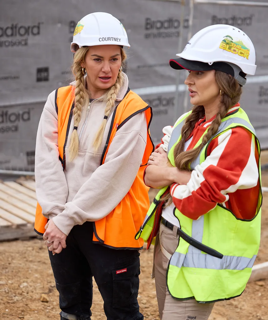 Courtney and Sev in hi-vis on site of The Block.