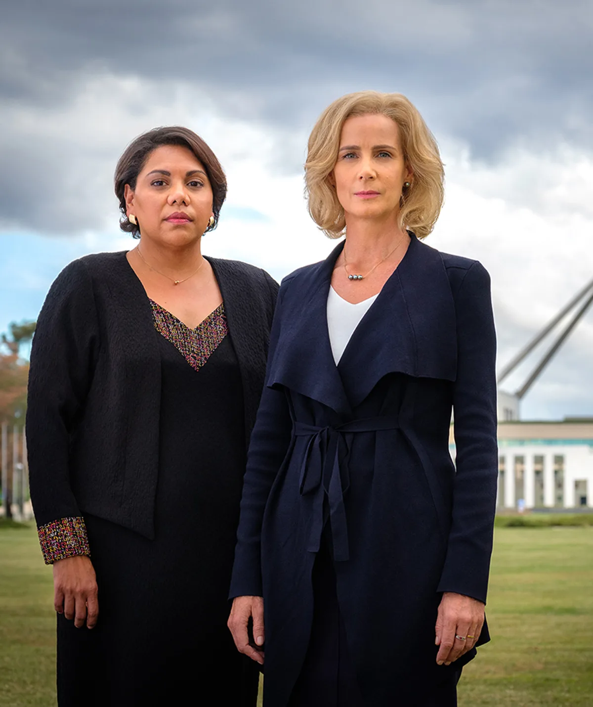 Deb stands next to Rachel Griffiths in front of Parliament House