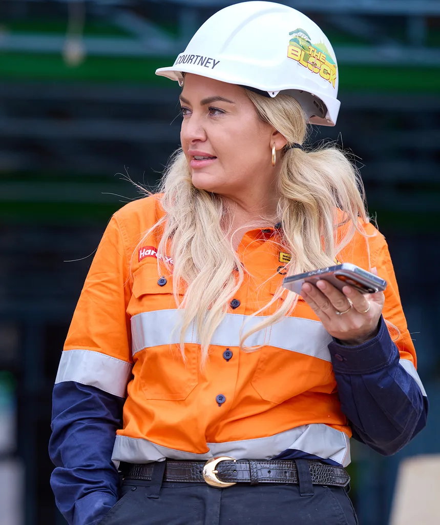 Courtney on the phone on site of The Block 2026.