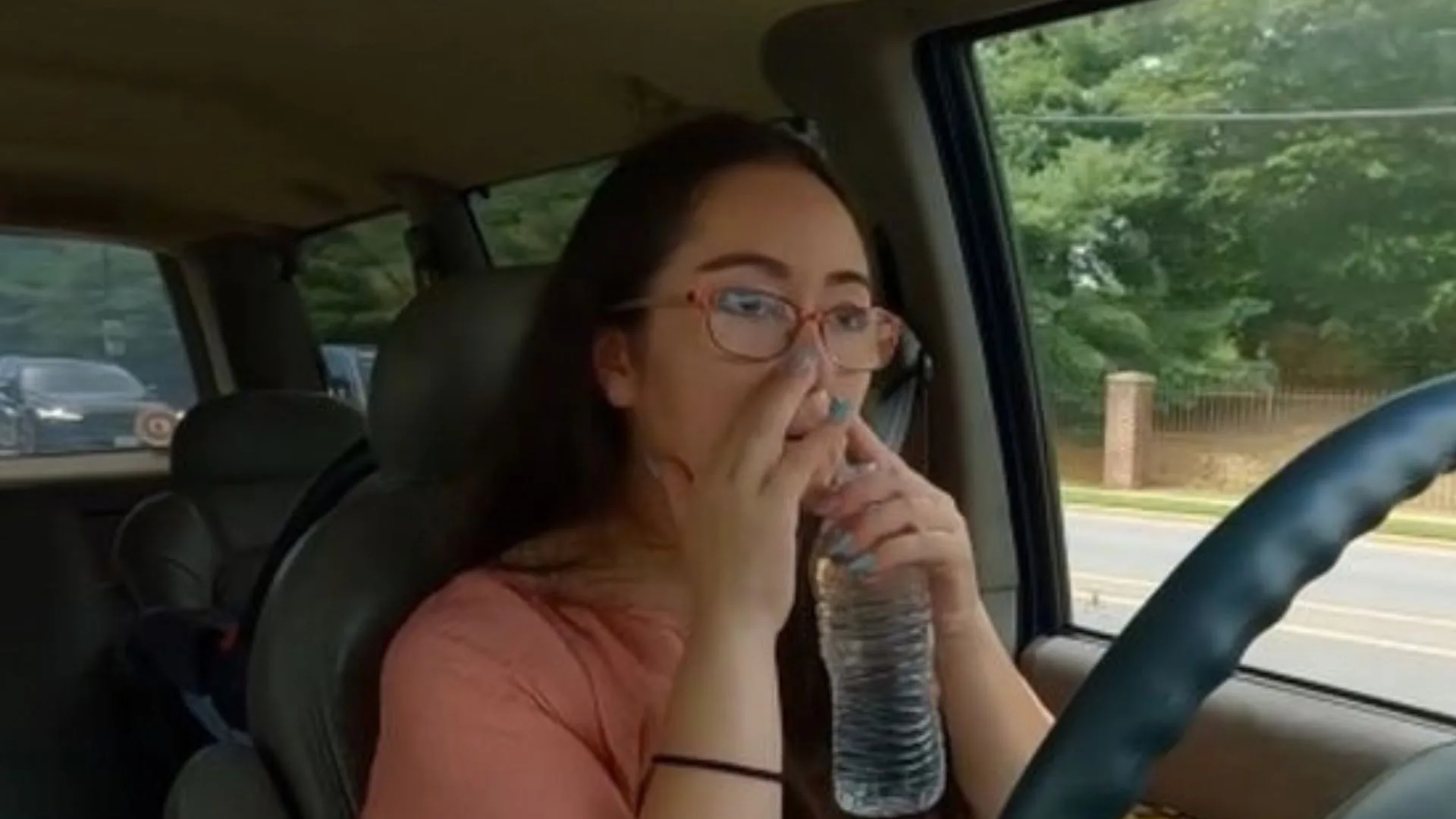 Kathryn Andrea is drinking water from her nose.