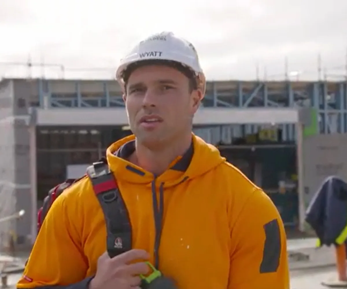 Wyatt on The Block site with his backup on before walking off site.