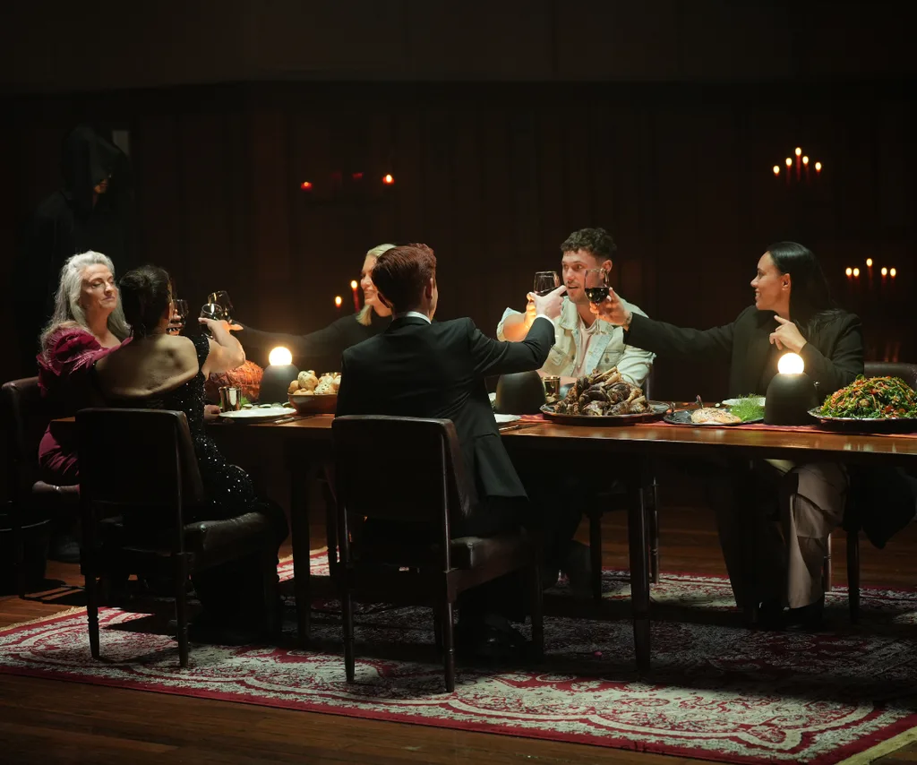 Kirby with her fellow players at the Traitors table.