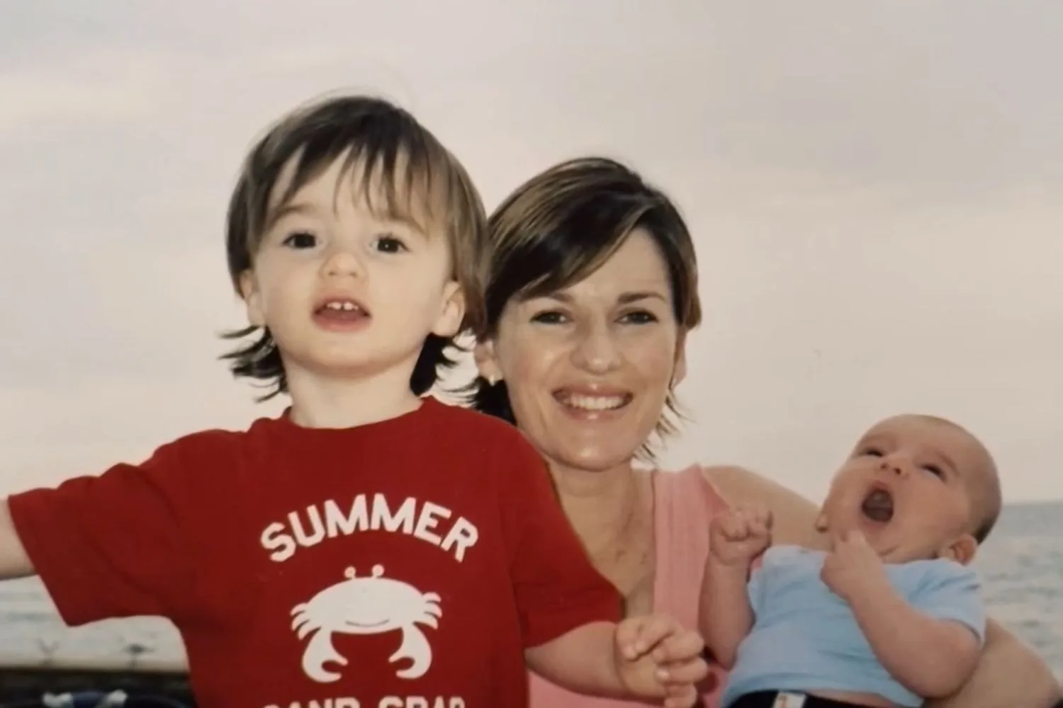 Kylie Gillies with Gus and Archie as a baby.