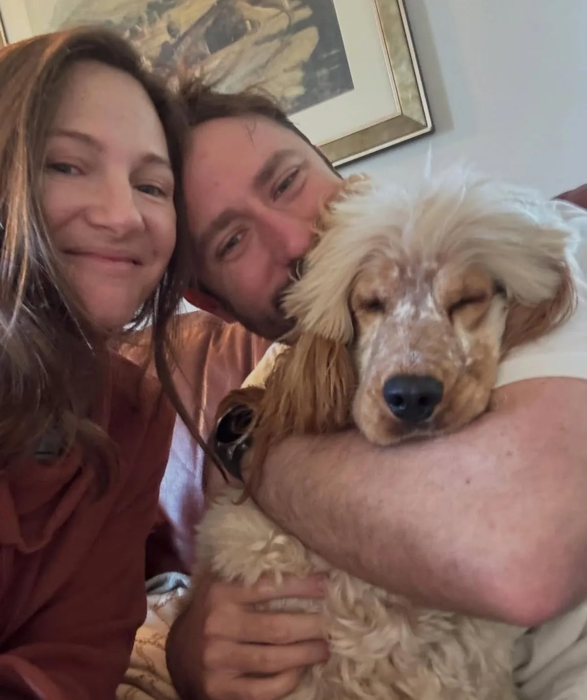 Cate Campbell and partner Adam Kerr with their dog