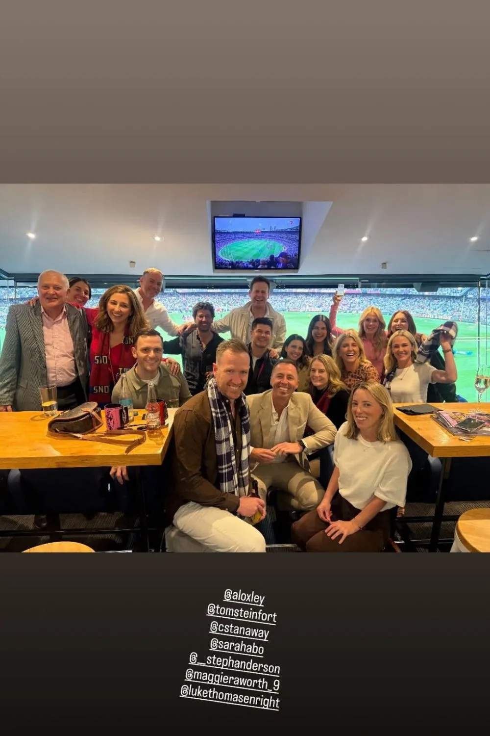 Sarah Abo with former colleagues at an NRL match