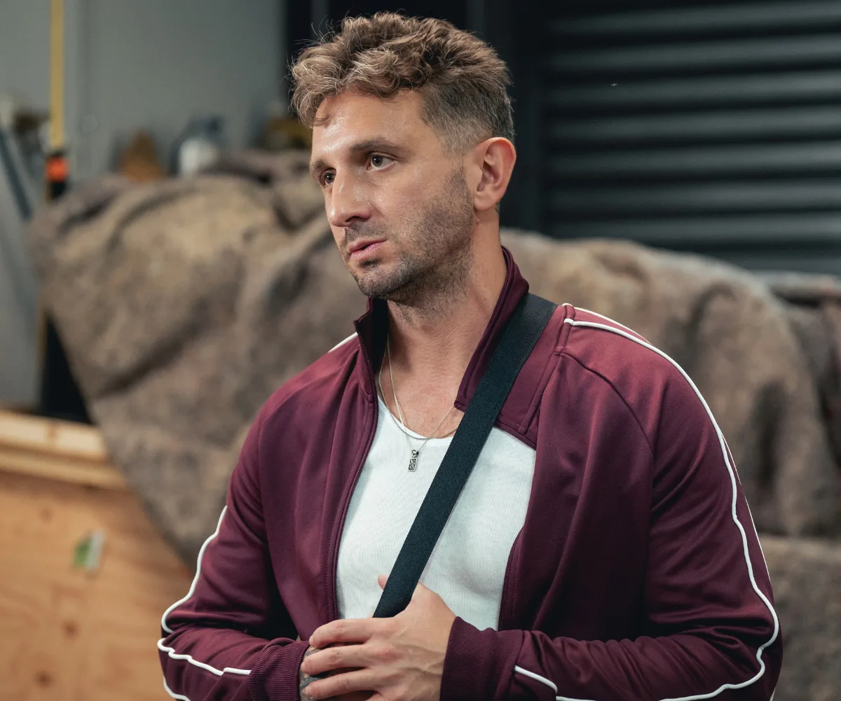 Tommy Little, wearing a checked shirt, on the set of Cop This