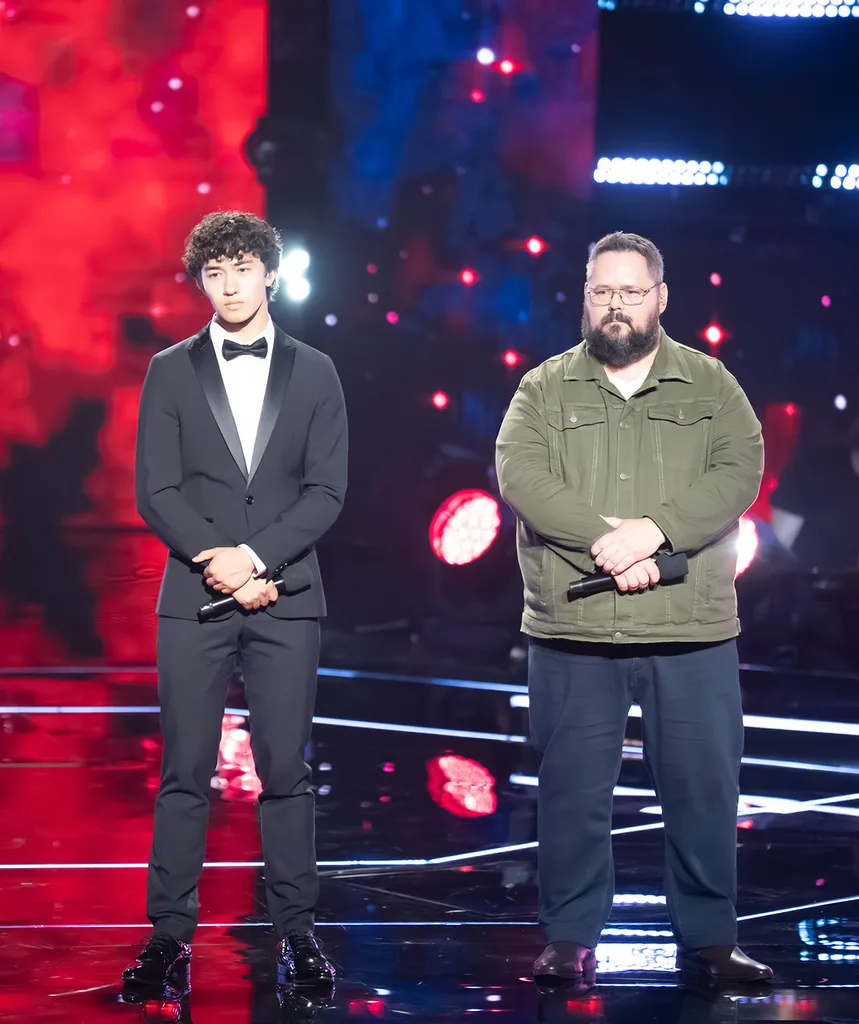 Saem stands next to Dicko on the set of The Voice