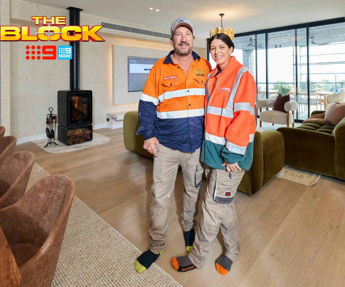 Adam and Jolene from The Block standing in their living room.