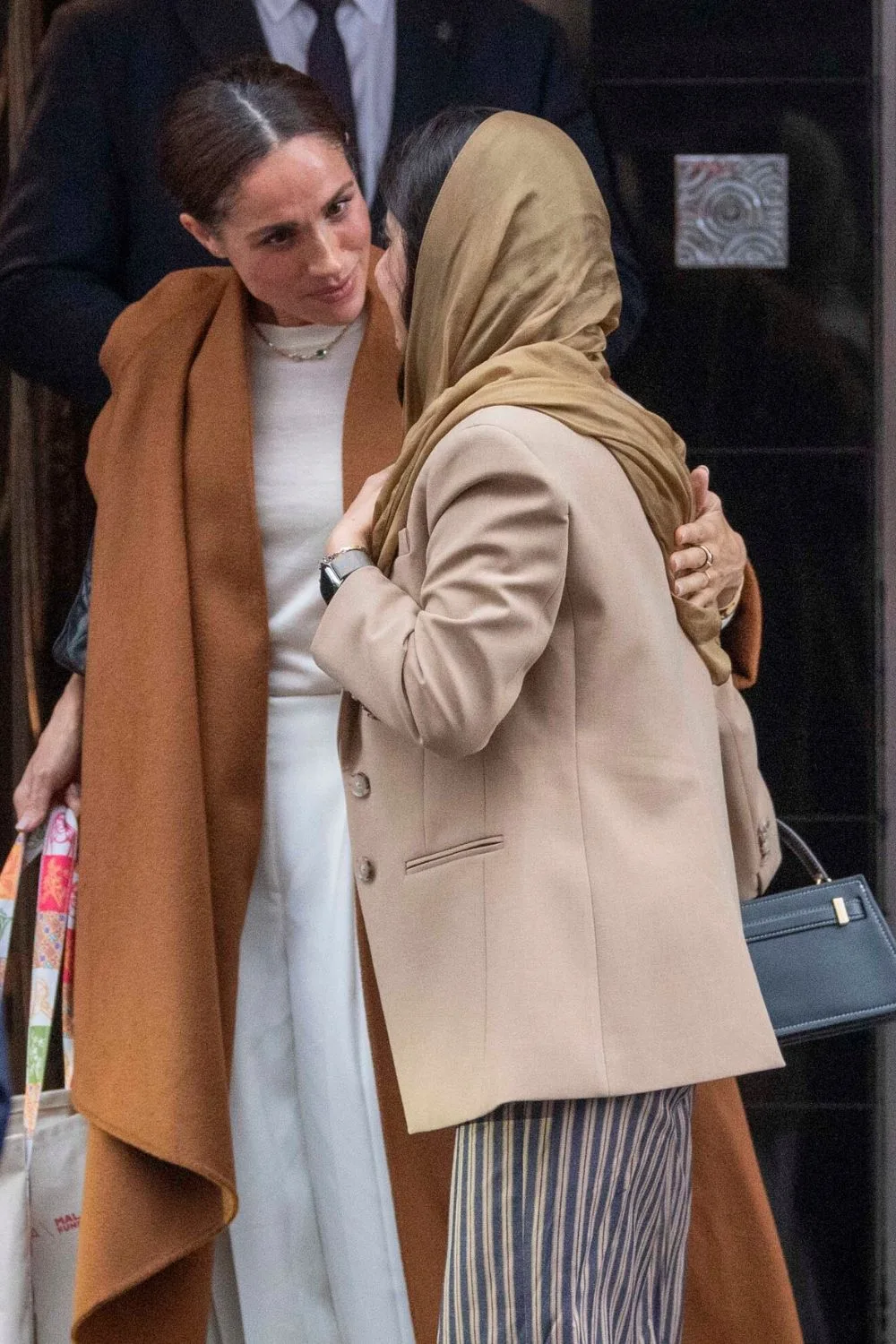 Meghan Duchess of Sussex and Malala Yousafzai outside Claridge's