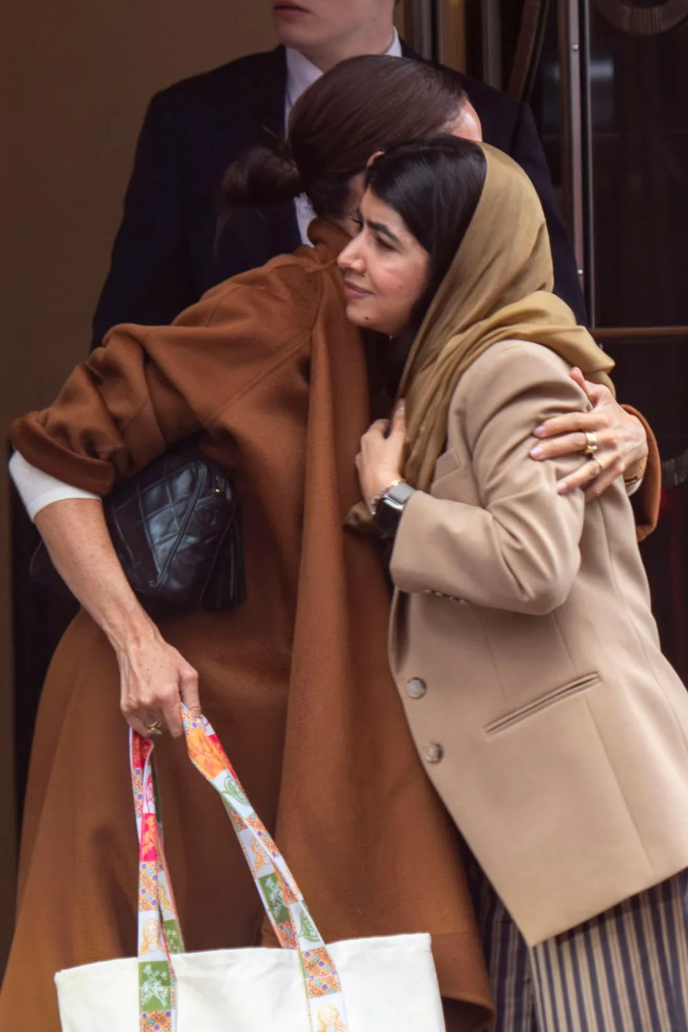 Meghan Duchess of Sussex and Malala Yousafzai outside Claridge's