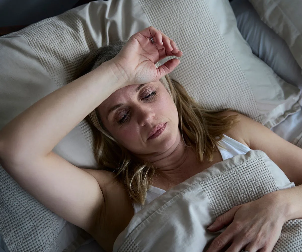 Woman struggling to sleep