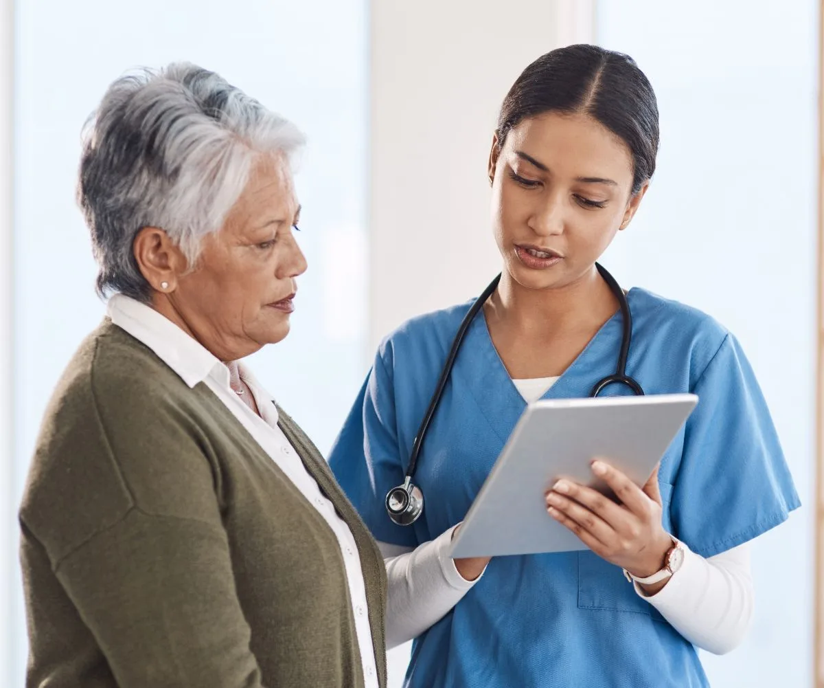 Older woman consulting with her doctor