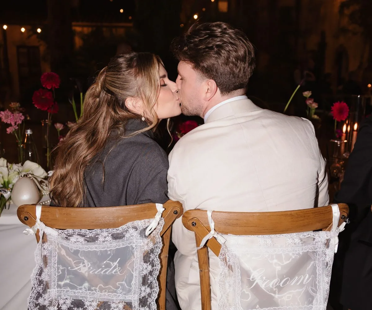 Jai Arrow kissing his wife on their wedding day