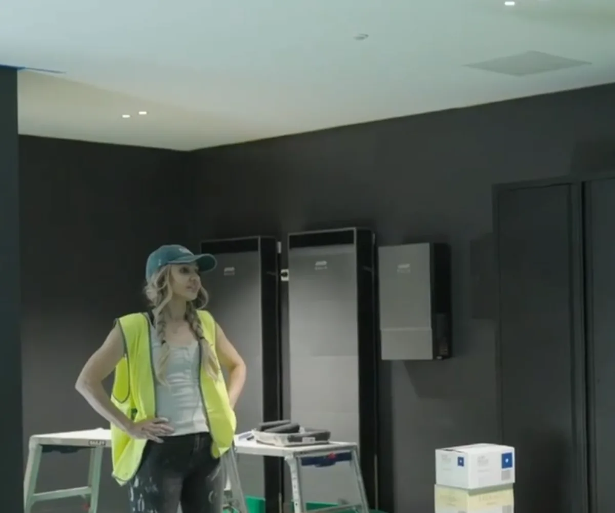 Sev in her garage on The Block. 