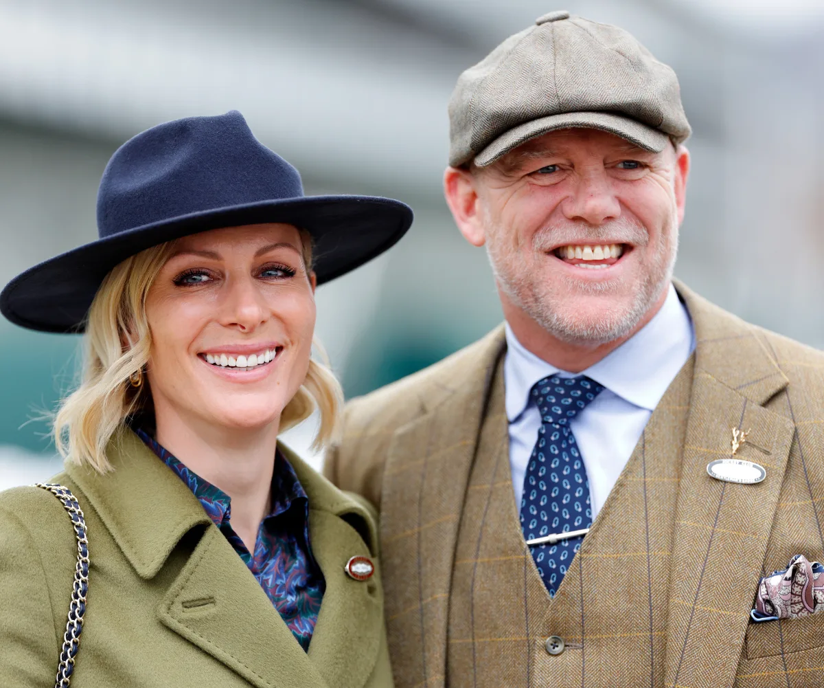 Zara Tindall in navy hat and her husband Mike Tindall in grey hat. 