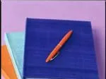Three stacked notebooks (blue, teal, orange) with an orange pen on top, against a purple background.