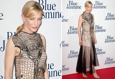 Cate Blanchett in a spider web gown at the "Blue Jasmine" event, smiling on the red carpet.