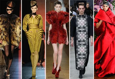Models wearing extravagant and avant-garde couture outfits in a variety of bold colors and unique designs.
