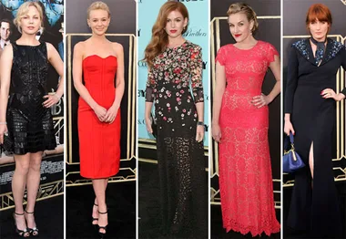 Five women in elegant red carpet attire at "The Great Gatsby" premiere, each wearing unique black and red dresses.