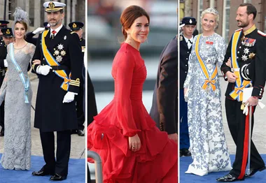 Royals in formal attire on a blue carpet attending the Dutch King's coronation event.