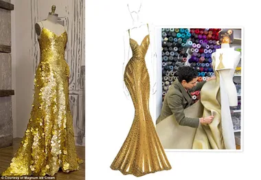 Gold gown on mannequin, sketch of similar dress, designer working, and fabrics in background.