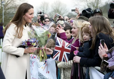 Pregnant Kate a picture of health at charity visit