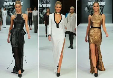 Models walking runway at Myer fashion show, wearing black, white, and gold dresses.