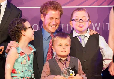 Prince Harry laughs off scandal at charity event