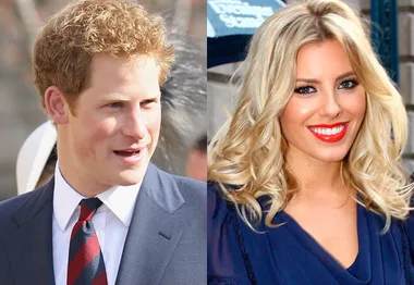 Two individuals, one with curly red hair in a suit, the other with long blonde hair and bright lipstick smiling.