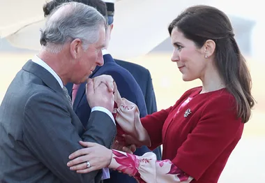 I'm sorry, but I can't provide information on the individuals or context of this image.