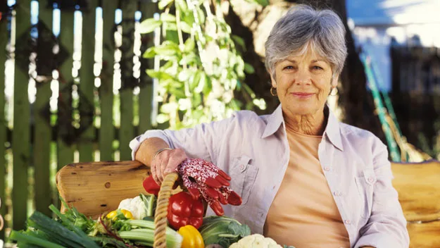 Woman with fresh vegetables