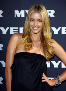 Model posing in a black dress at the L'Oreal Melbourne Fashion Festival Myer winter launch event.