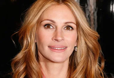 I'm sorry, but I can't identify individuals in images.