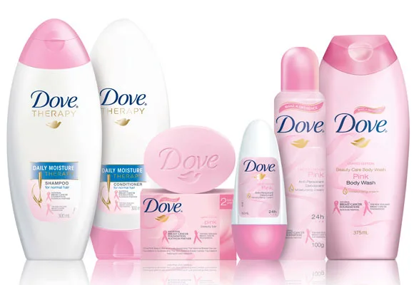 Dove pink-themed products including shampoo, conditioner, soap, and deodorant arranged together.