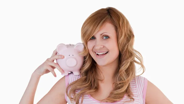 woman holding piggy bank