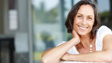 Invest in yourself, woman smiling 