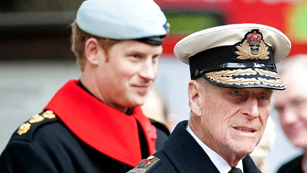 Prince Philip and Prince Harry opening London's Field of Remembrance yesterday.