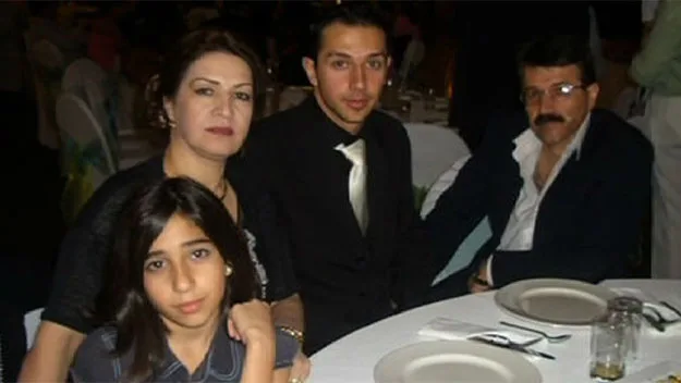 Arman Abrahimzadeh photographed with his family.